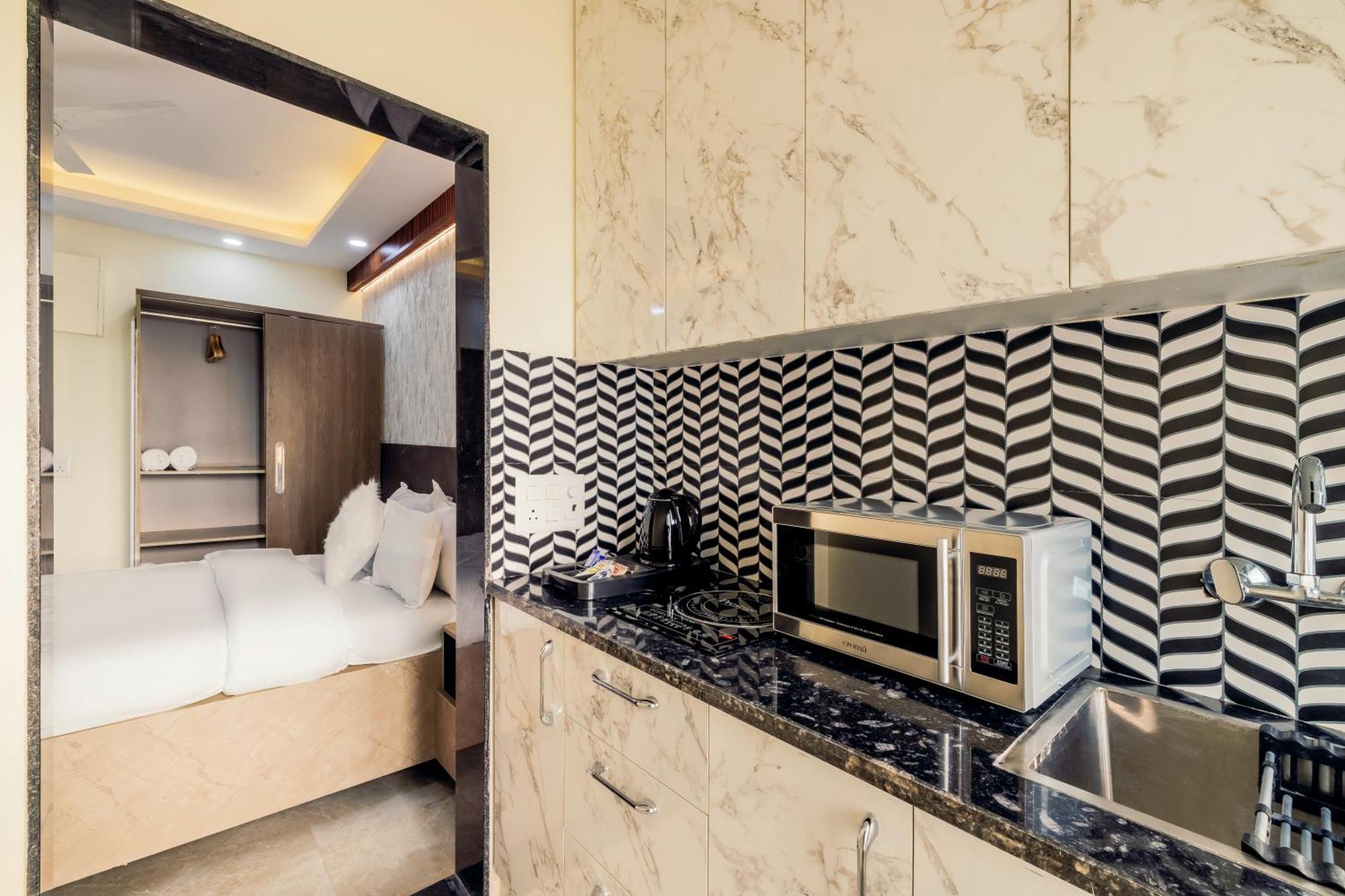 Kyomi Service Apartments Ґурґаон Екстер'єр фото